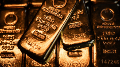 Giá vàng tăng mạnh, USD trượt dốc sau phát biểu của ông Powell