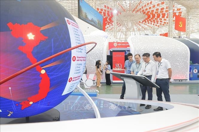 Thiết bị trải nghiệm mini game tại Khu trưng bày của TTXVN tại Triển lãm. Ảnh: TTXVN.