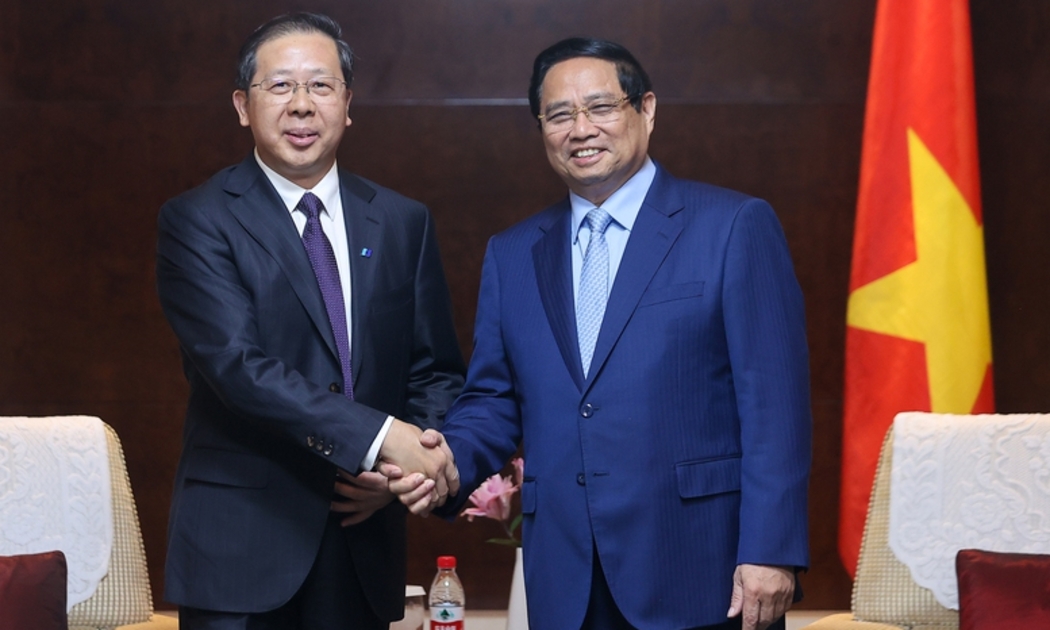 Thủ tướng Phạm Minh Chính tiếp Chủ tịch HĐQT Tập đoàn Khoa học kỹ thuật Huadian (Hoa Điện) Bành Cương Bình - Ảnh: VGP