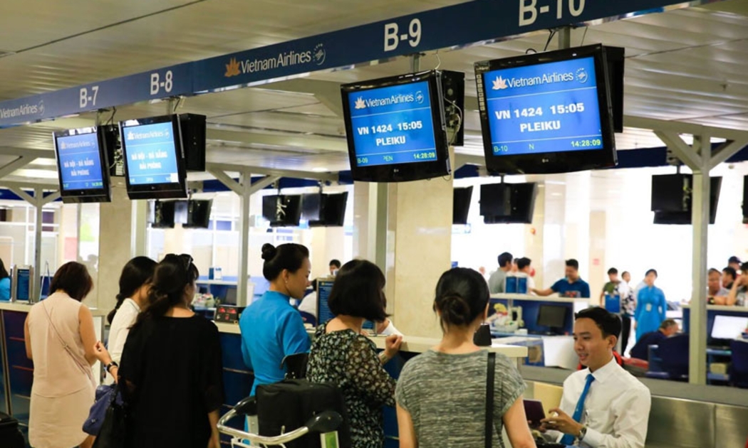 Hành khách làm thủ tục check-in tại sân bay. Ảnh minh hoạ.
