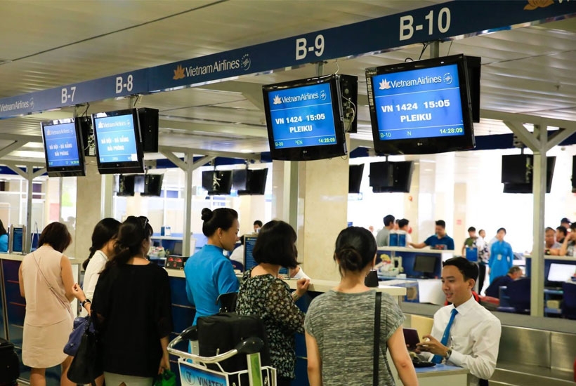 Hành khách làm thủ tục check-in tại sân bay. Ảnh minh hoạ.