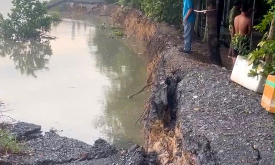 Khu vực sạt lở thuộc công trình thủy lợi bờ hữu ven sông Sài Gòn - Bắc Rạch Tra, hồi tháng 6/2025. Ảnh tư liệu của BCHQS huyện Củ Chi