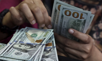 Đồng yên và đồng USD cùng giảm giá
