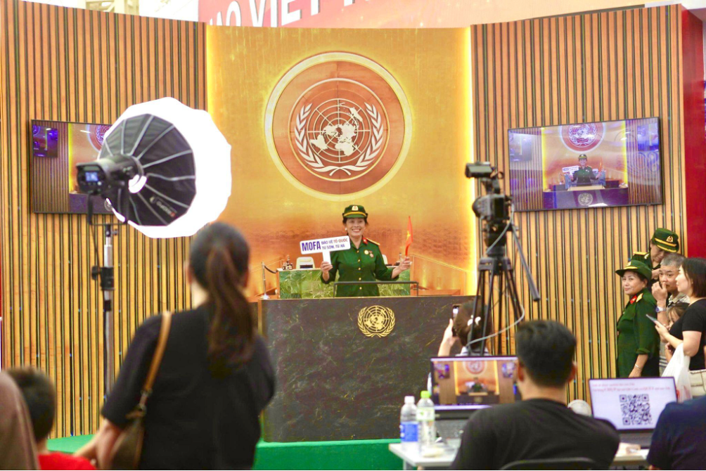 The United Nations Podium check-in area, modeled after the UN General Assembly Hall, attracts numerous visitors for photos and interactive experiences.
