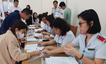 Kiểm tra các doanh nghiệp về tình hình đóng bảo hiểm xã hội tại Hà Nội. Ảnh: TH.