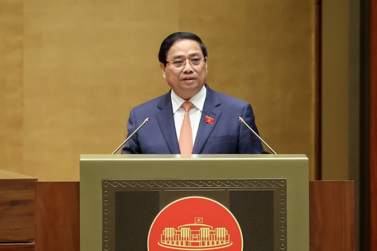 Thủ tướng Chính phủ Phạm Minh Chính trình bày Báo cáo tóm tắt kết quả thực hiện Kế hoạch phát triển kinh tế - xã hội năm 2025 và 5 năm 2021 - 2025; dự kiến kế hoạch phát triển kinh tế - xã hội năm 2026 - Ảnh: VGP.