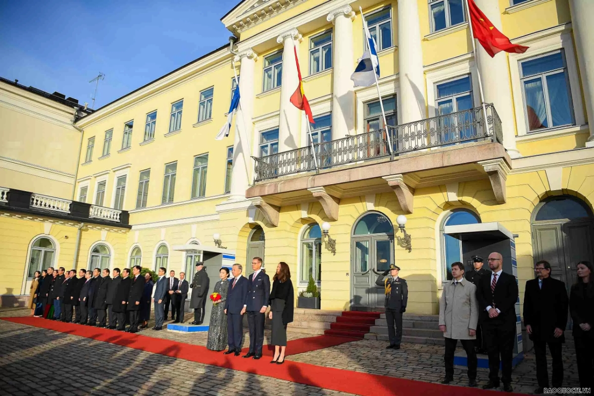 Hai nhà lãnh đạo cùng phu nhân có bức chụp ảnh chung. Ảnh: TTXVN