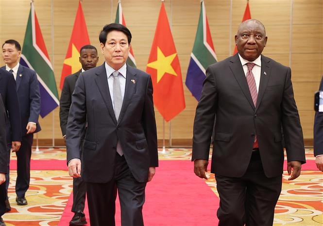 Chủ tịch nước Lương Cường và Tổng thống Nam Phi Matamela Cyril Ramaphosa dự tiệc chiêu đãi. Ảnh: TTXVN.
