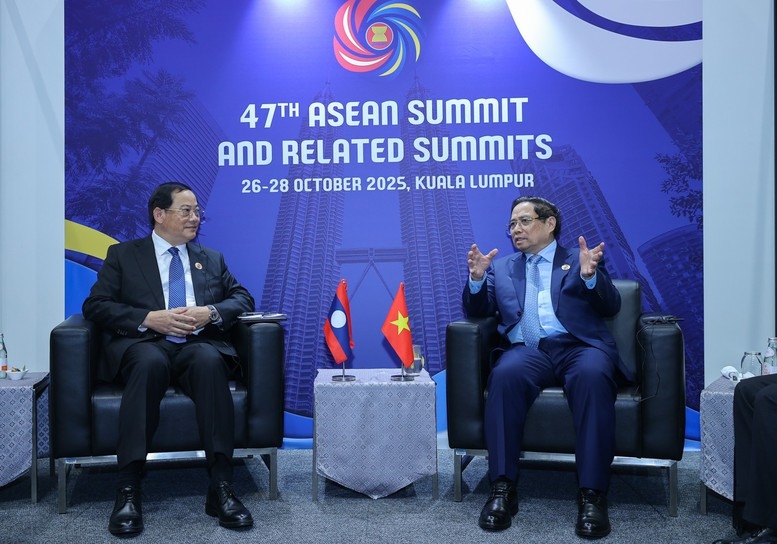 Thủ tướng Chính phủ Phạm Minh Chính khẳng định Việt Nam luôn ủng hộ mạnh mẽ, toàn diện công cuộc đổi mới của Lào - Ảnh: VGP