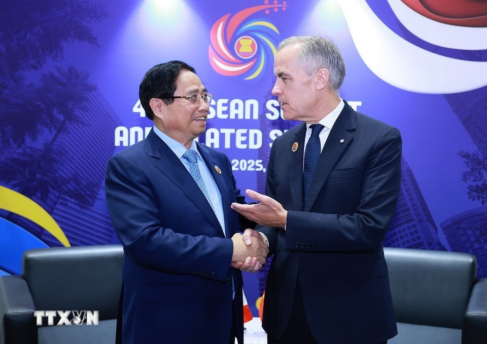 Thủ tướng Phạm Minh Chính gặp Thủ tướng Canada Mark Carney. Ảnh: TTXVN