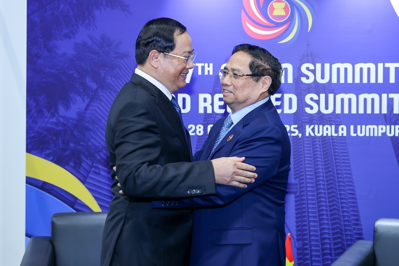 Thủ tướng Chính phủ Phạm Minh Chính gặp Thủ tướng Lào Sonexay Siphandone - Ảnh: VGP