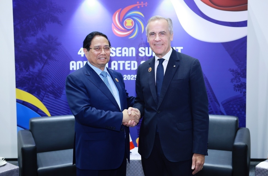 Thủ tướng Phạm Minh Chính gặp Thủ tướng Canada Mark Carney. Ảnh: TTXVN