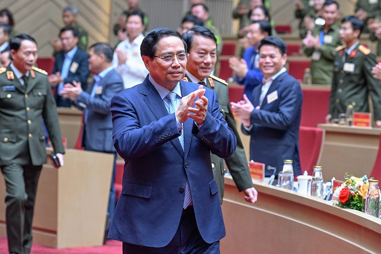 Thủ tướng Phạm Minh Chính dự Hội nghị sơ kết 1 năm triển khai lực lượng tham gia bảo vệ an ninh, trật tự ở cơ sở - Ảnh: VGP