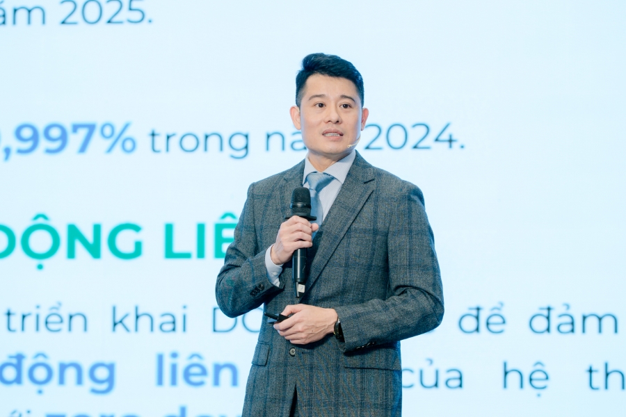 Ông Nguyễn Hoàng Long, Phó Tổng Giám đốc Công ty Cổ phần Thanh toán Quốc gia Việt Nam (NAPAS) đã chia sẻ tham luận 