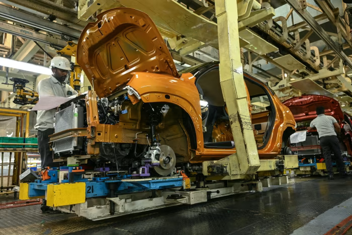 <i>Công nhân lắp ráp xe tại nhà máy chung của Renault-Nissan ở Ấn Độ. Ảnh: Getty Images.</i>