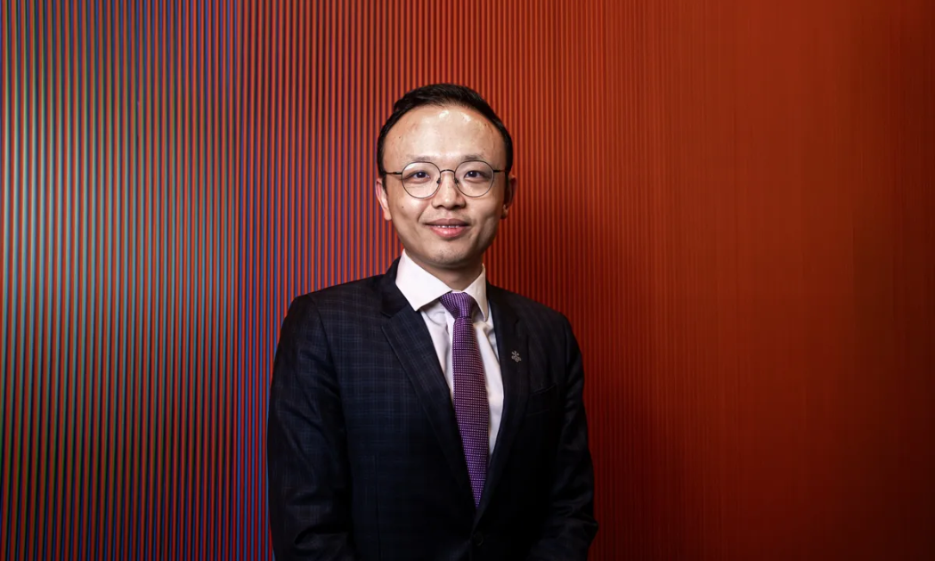 Chuyên gia John Lam của UBS - Ảnh: Bloomberg.