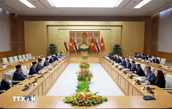 Thủ tướng Phạm Minh Chính hội kiến Quốc vương Brunei Darussalam Haji Hassanal Bolkiah. Ảnh: TTXVN.