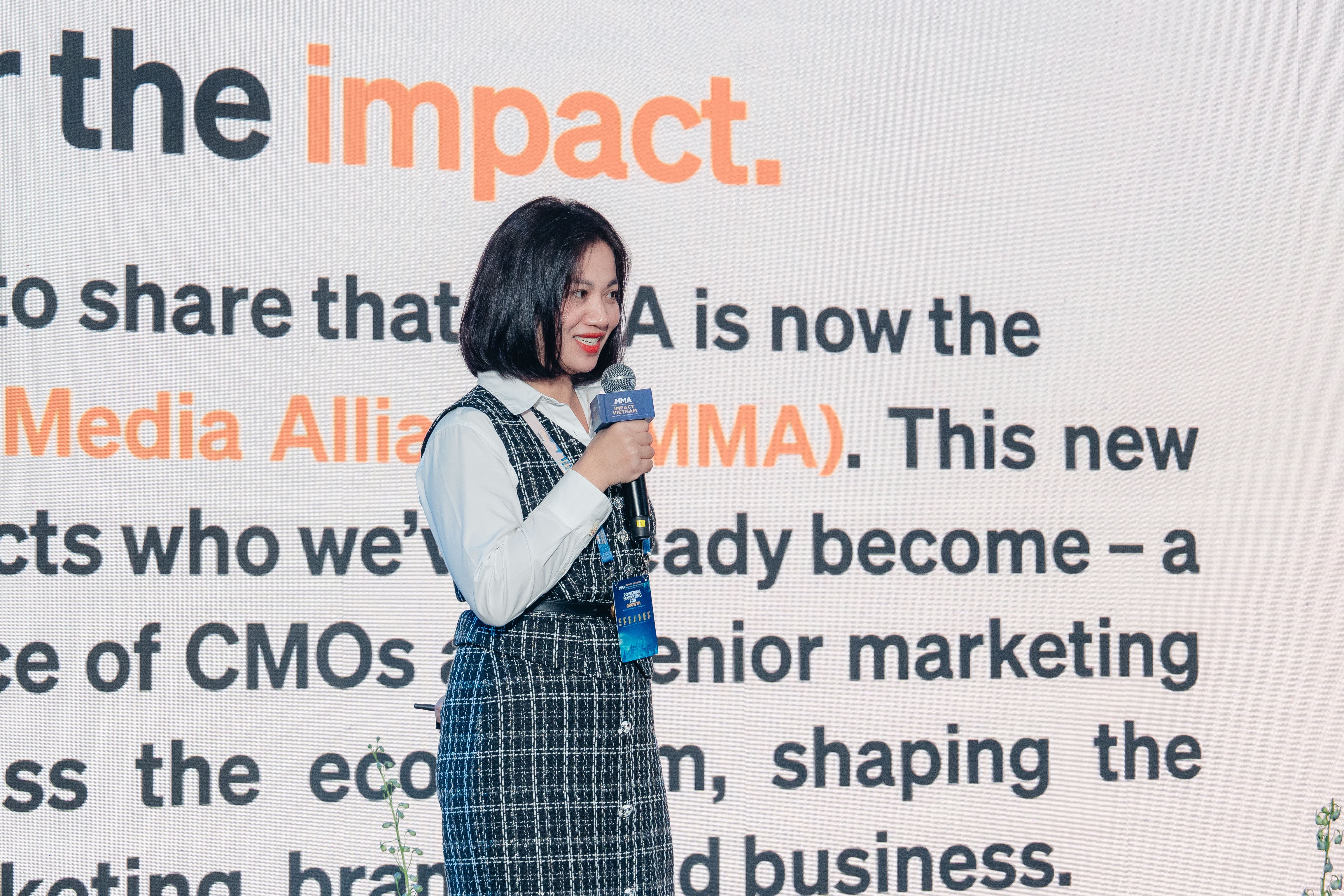 Bà Phan Bích Tâm chia sẻ tại sự kiện MMA IMPACT Vietnam 2025.