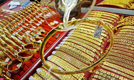 Đà giảm của giá vàng trong nước chỉ bằng 1/9 so với thế giới