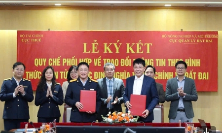 Lễ ký Quy chế phối hợp về trao đổi thông tin theo hình thức điện tử. Ảnh VGP