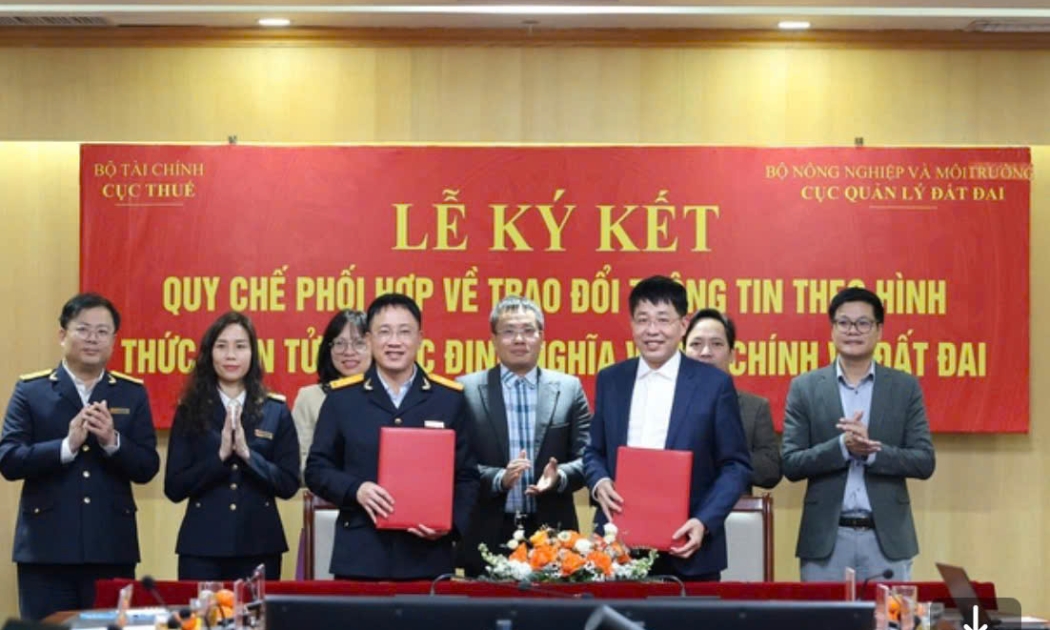 Lễ ký Quy chế phối hợp về trao đổi thông tin theo hình thức điện tử. Ảnh VGP