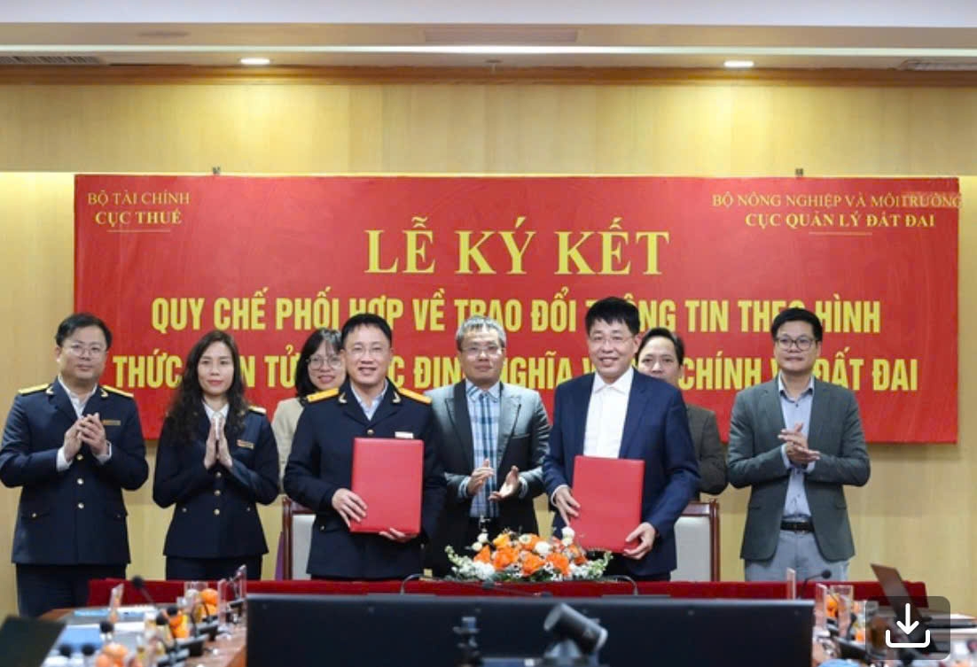 Lễ ký Quy chế phối hợp về trao đổi thông tin theo hình thức điện tử. Ảnh VGP