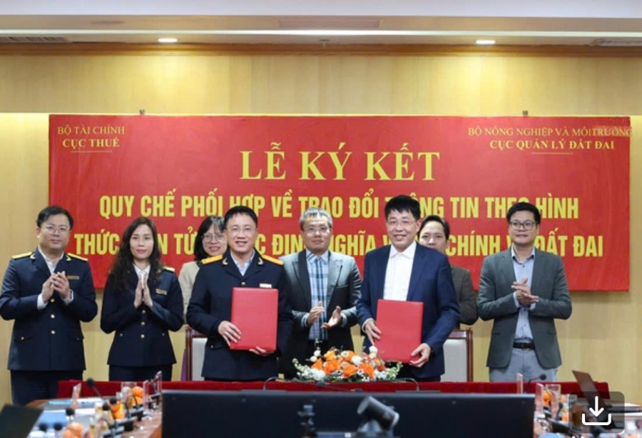 Lễ ký Quy chế phối hợp về trao đổi thông tin theo hình thức điện tử. Ảnh VGP