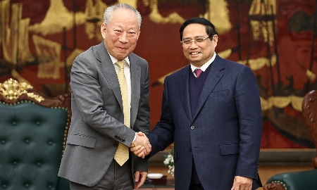 Thủ tướng Phạm Minh Chính tiếp ông Nghiêm Giới Hòa, người sáng lập Tập đoàn xây dựng Thái Bình Dương. Ảnh: VGP.