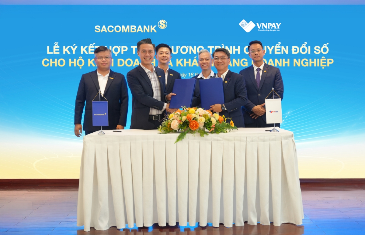 Sacombank và VNPAY ký kết hợp tác chuyển đổi số cho hộ kinh doanh và khách hàng doanh nghiệp.