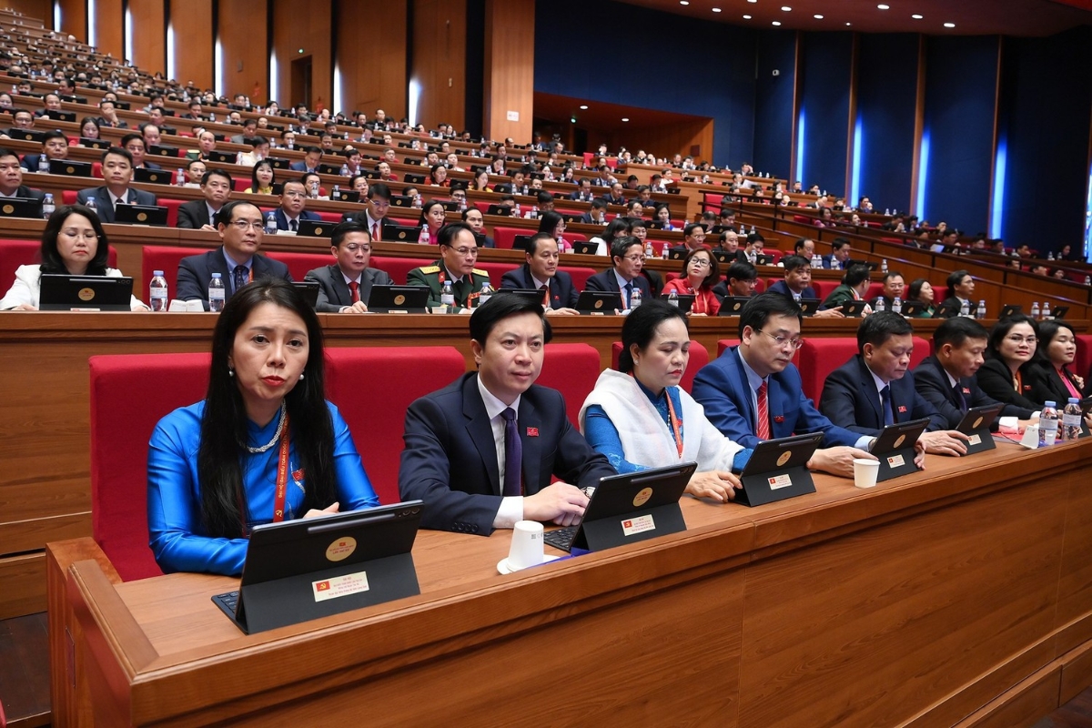 Các đại biểu dự phiên thảo luận tại hội trường về các Văn kiện Đại hội. Ảnh: Nhân Dân