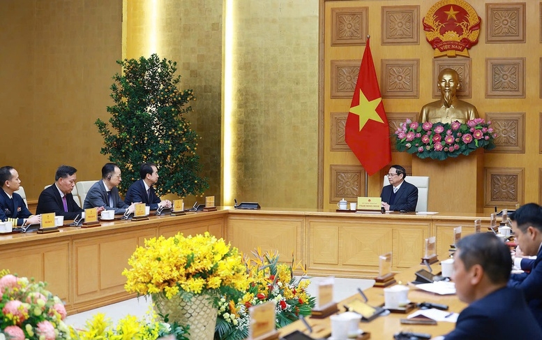 Thủ tướng Chính phủ Phạm Minh Chính và Đại sứ Hà Vĩ đã cùng nhìn lại những tiến triển rất tích cực của quan hệ Việt - Trung trong năm 2025 - Ảnh: VGP