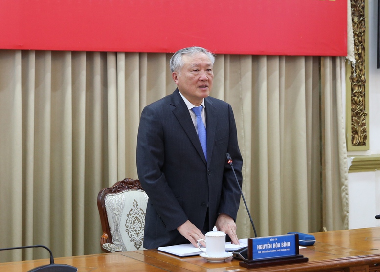 Phó Thủ tướng Thường trực Nguyễn Hòa Bình làm việc với lãnh đạo các bộ, ngành chức năng, TPHCM và TP. Đà Nẵng về tình hình triển khai hoạt động Trung tâm tài chính quốc tế Việt Nam tại 2 địa phương - Ảnh: VGP/Nguyễn Hoàng