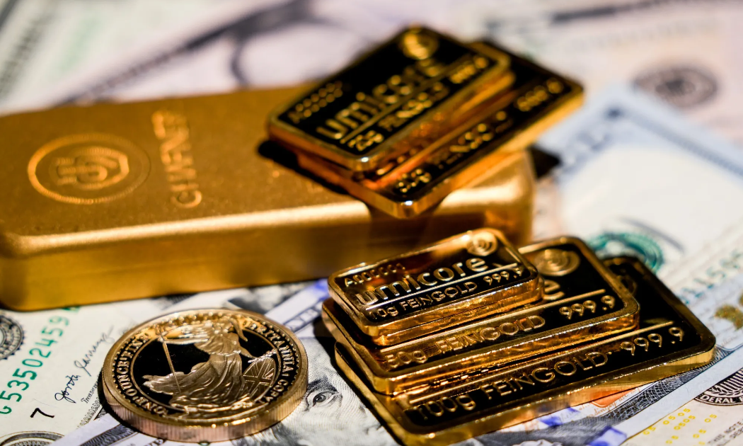 Vàng sụt giá do USD mạnh lên, SPDR Gold Trust mua thêm gần 8 tấn