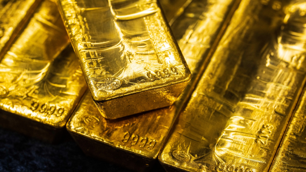 Vàng hồi giá khi USD suy yếu, SPDR Gold Trust bán ồ ạt