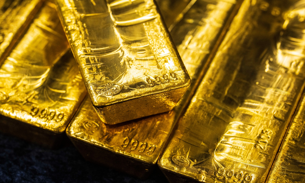 Vàng hồi giá khi USD suy yếu, SPDR Gold Trust bán ồ ạt