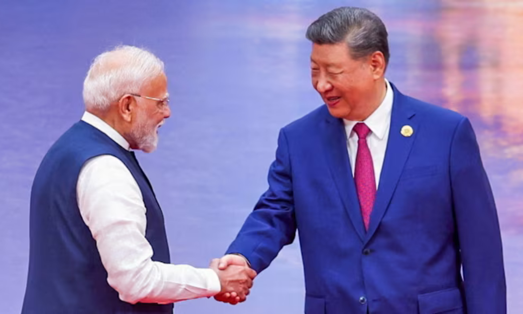 Thủ tướng Ấn Độ Narendra Modi (bên trái) và Chủ tịch Trung Quốc Tập Cận Bình đang nỗ lực thúc đẩy quan hệ song phương - Ảnh: Reuters.