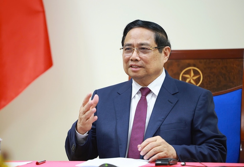 Thủ tướng Chính phủ Phạm Minh Chính điện đàm, trao đổi với Thủ tướng Algeria Sifi Ghrieb - Ảnh: VGP