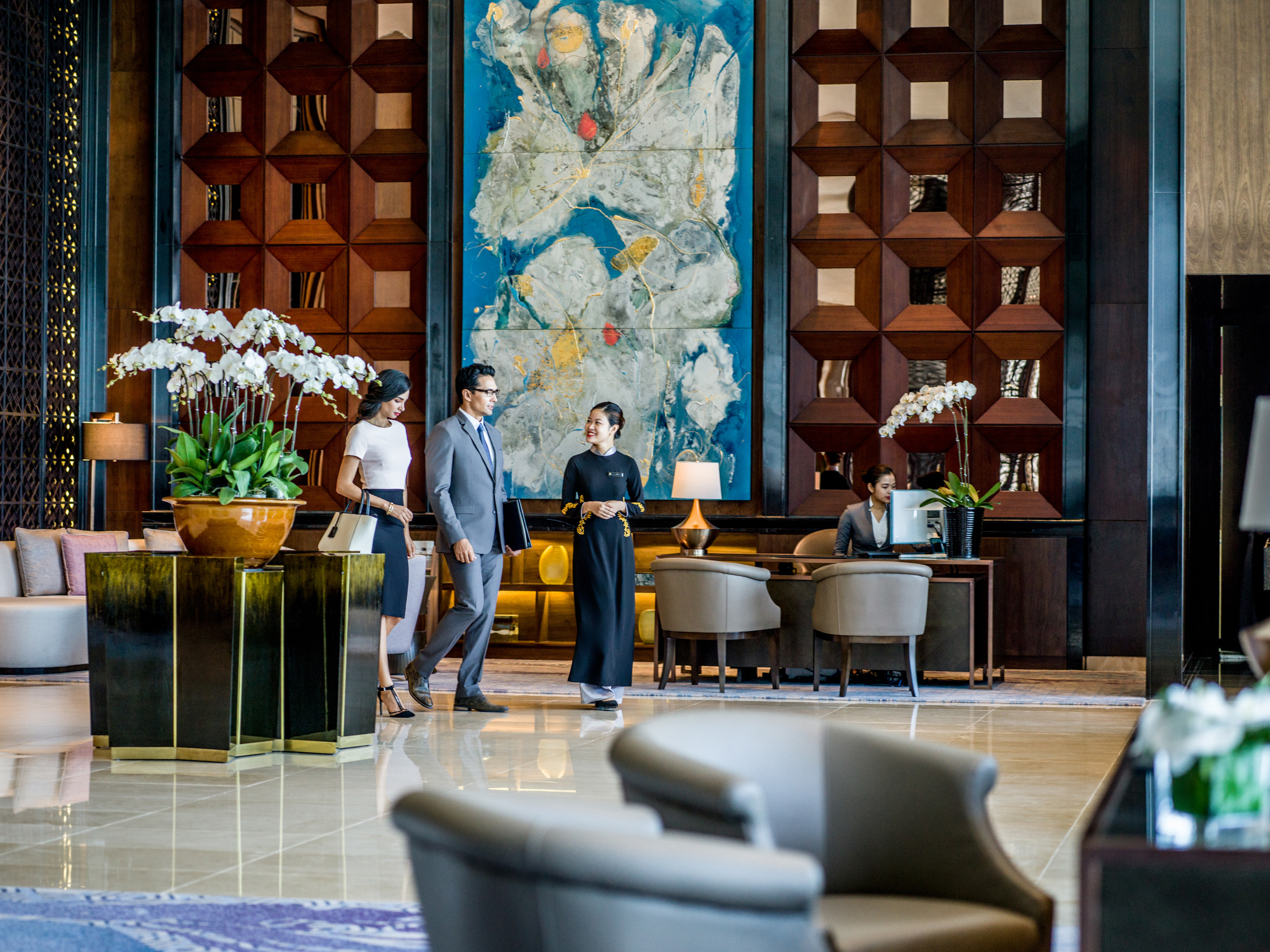 The reception area at InterContinental Hanoi Landmark72 welcomes guests with a sleek, contemporary design and panoramic views that set the tone for an elevated stay above the city.