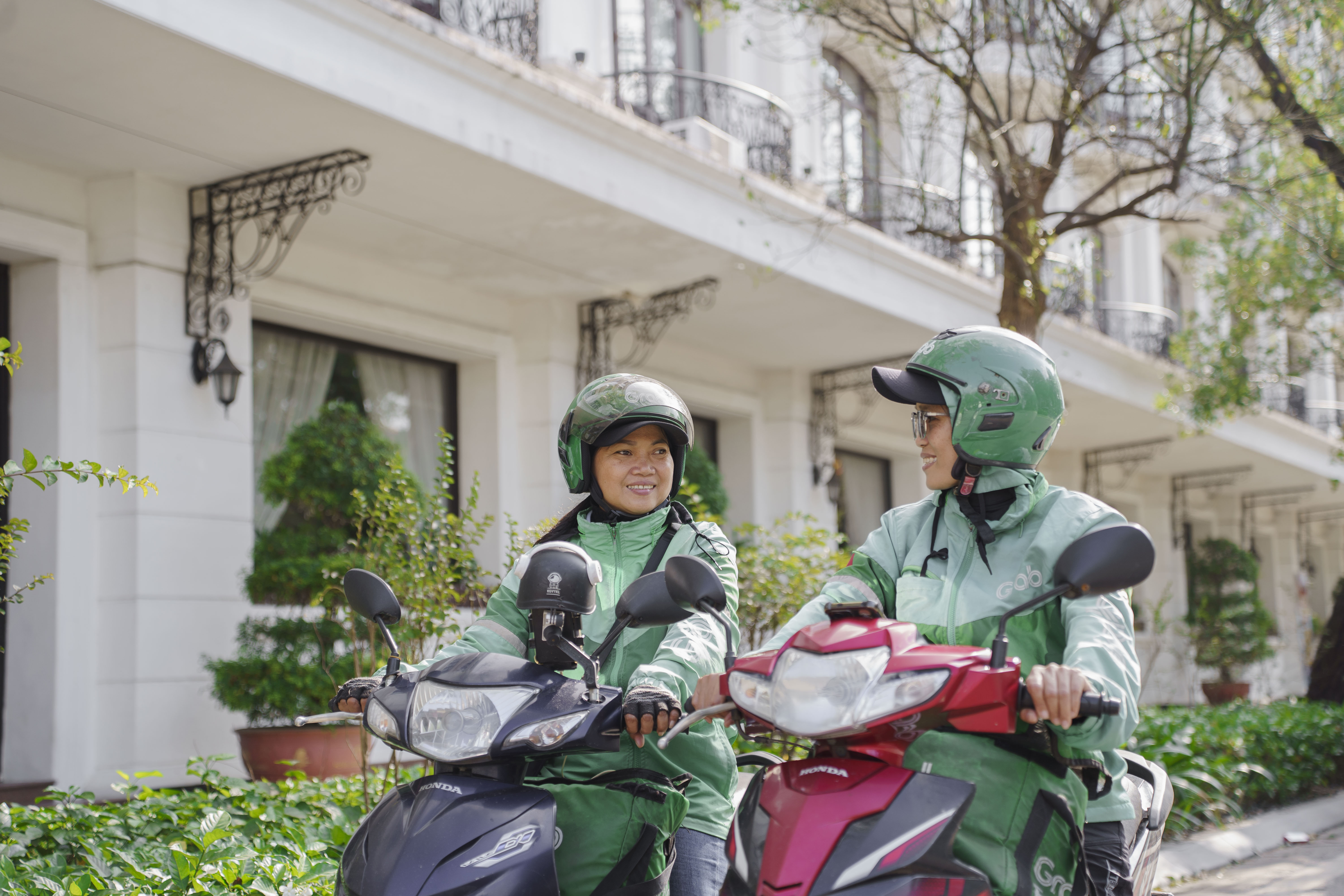 Grab Việt Nam đã triển khai nhiều sáng kiến hỗ trợ nữ đối tác tài xế. Ảnh: Grab Việt Nam.