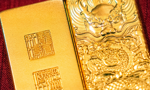 Vàng sụt giá mạnh do USD bật tăng trở lại