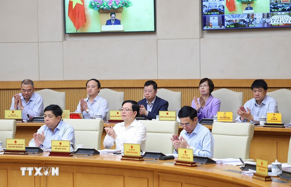 Thành viên Chính phủ và các đại biểu tham dự hội nghị. Ảnh: TTXVN