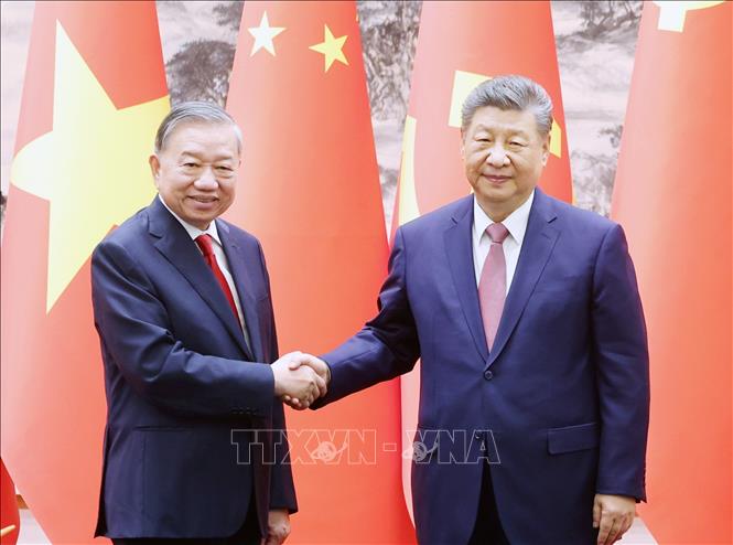 Tổng Bí thư, Chủ tịch nước Tô Lâm và Tổng Bí thư, Chủ tịch nước Tập Cận Bình tại cuộc chứng kiến Lễ ký các văn kiện hợp tác giữa hai nước. Ảnh: TTXVN