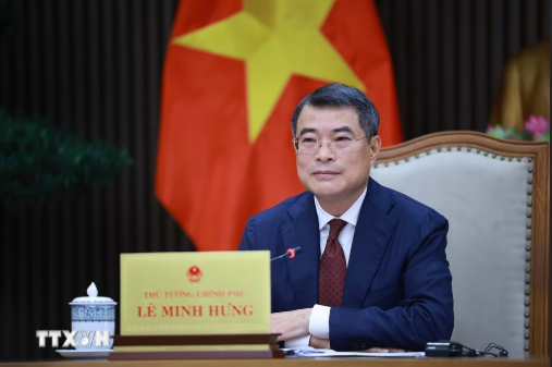 Thủ tướng Lê Minh Hưng điện đàm với Thủ tướng Singapore Lawrence Wong. Ảnh: TTXVN