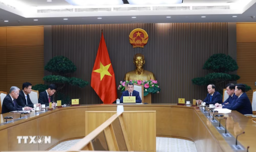 Thủ tướng Lê Minh Hưng điện đàm với Thủ tướng Singapore Lawrence Wong. Ảnh: TTXVN