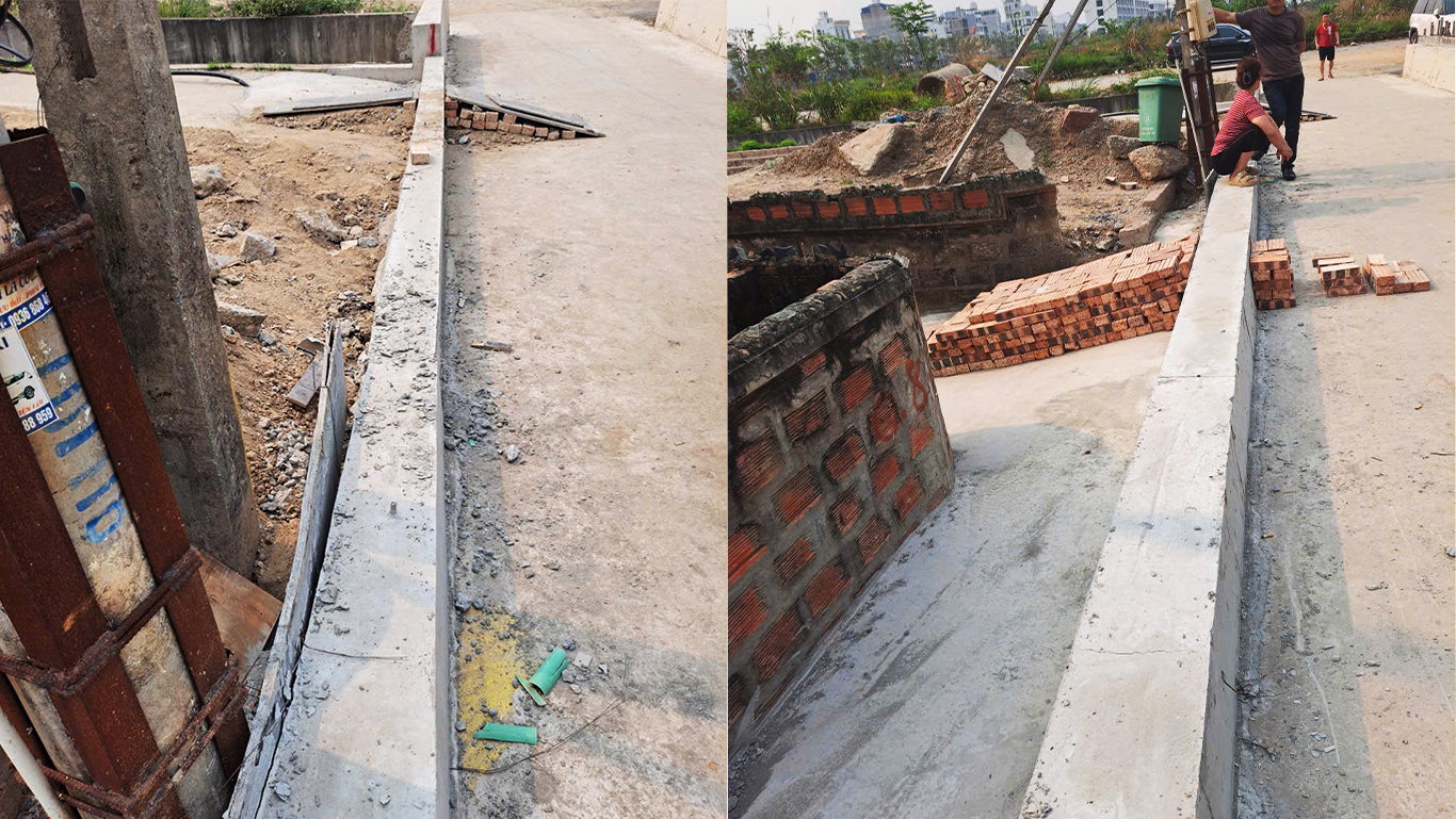 Cơ quan chức năng đề nghị chủ đầu tư phá dỡ tường bao và con lươn bê tông ngăn lối đi khu dân cư.