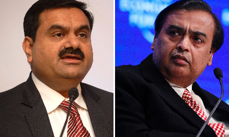 Hai tỷ phú Ấn Độ Gautam Adani (trái) và Mukesh Ambani (phải) - Ảnh: Bloomberg.