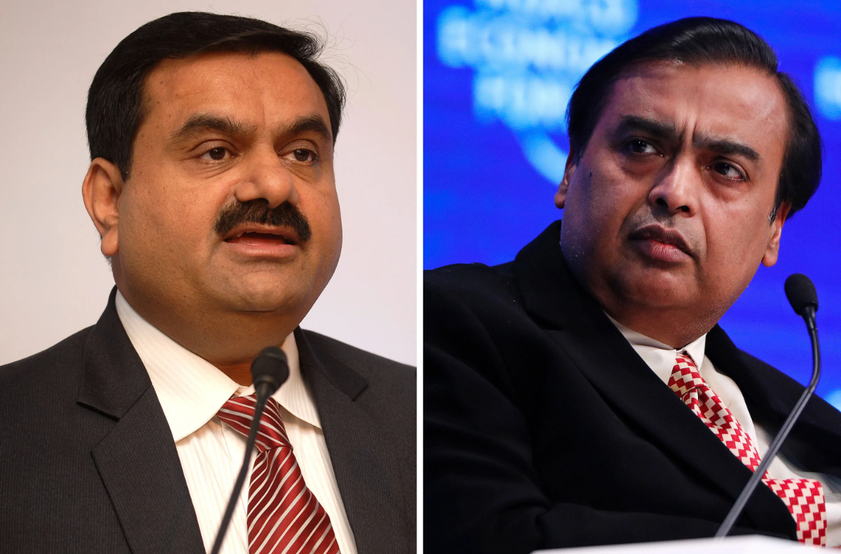 Hai tỷ phú Ấn Độ Gautam Adani (trái) và Mukesh Ambani (phải) - Ảnh: Bloomberg.