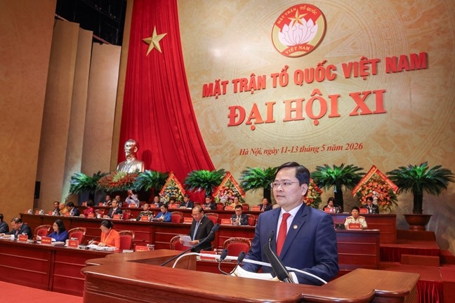 Ông Nguyễn Anh Tuấn, Ủy viên Ban Chấp hành Trung ương Đảng, Phó Chủ tịch Ủy ban Trung ương Mặt trận Tổ quốc Việt Nam, Chủ tịch Tổng Liên đoàn Lao động Việt Nam trình bày tại Đại hội. Ảnh: Mặt trận.