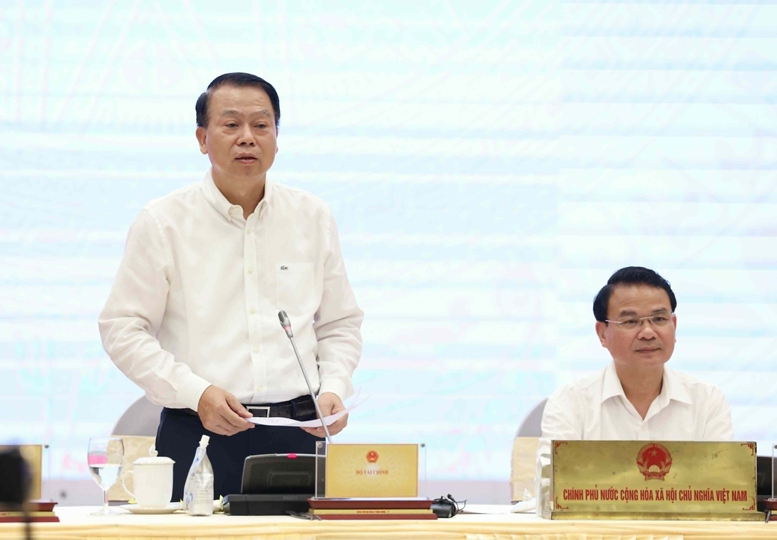 Thứ trưởng Bộ Tài Chính Nguyễn Đức Chi trả lời câu hỏi của Tạp chí Kinh tế Việt Nam/vnEconomy  về tiến độ triển khai và giải ngân các chương trình mục tiêu quốc gia - Ảnh: VGP/QP