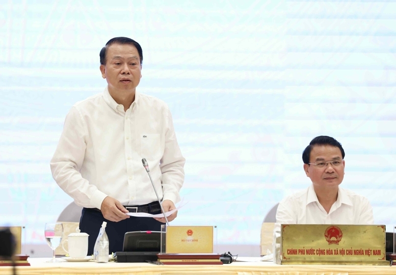 Thứ trưởng Bộ Tài Chính Nguyễn Đức Chi trả lời câu hỏi của Tạp chí Kinh tế Việt Nam/vnEconomy  về tiến độ triển khai và giải ngân các chương trình mục tiêu quốc gia - Ảnh: VGP/QP